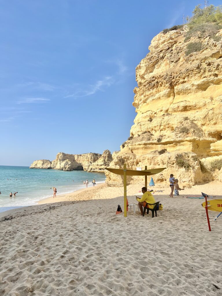 View from the ground level of Praia da Marinha Beach