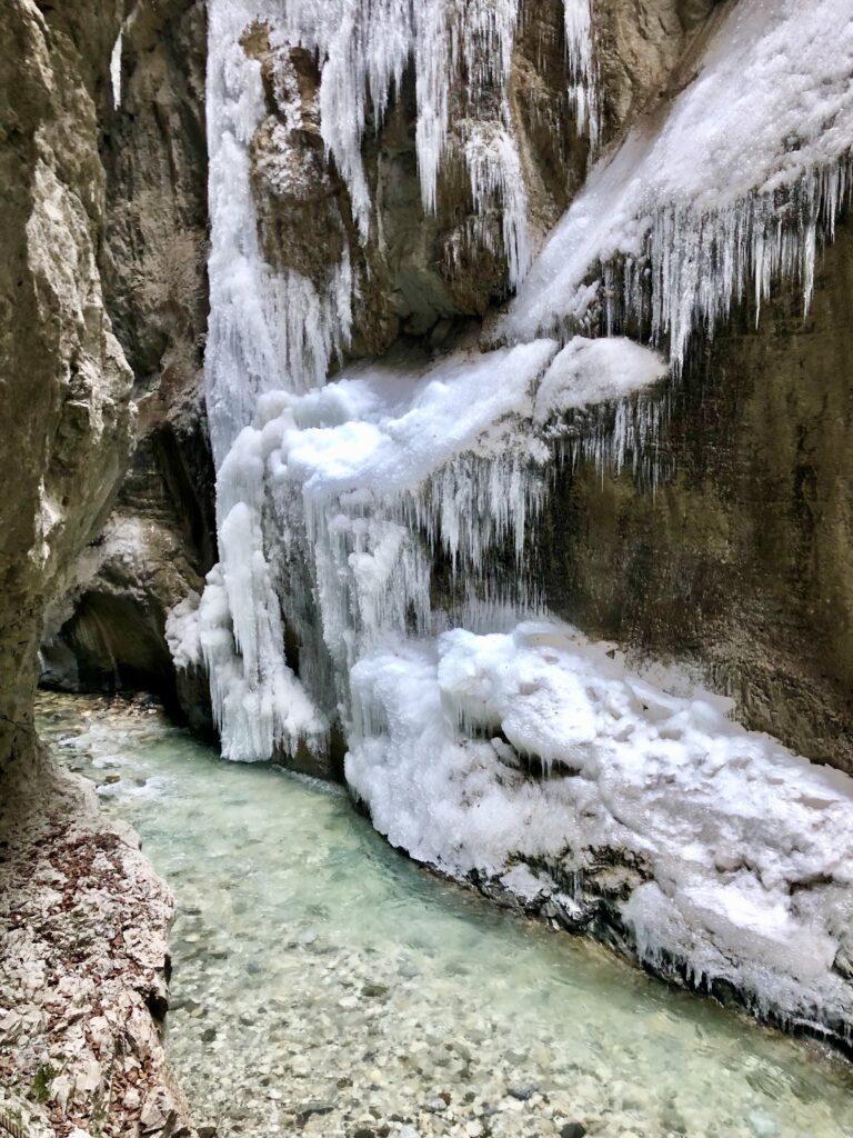 frozen icicles cover the Partnach Gorge in Bavaria Germany