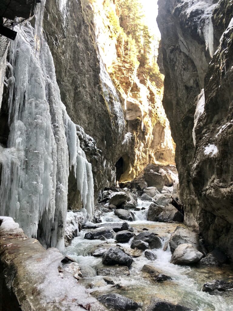 Beautiful icy formations on the rocks during the hike through the Partnachklamm in Germany 