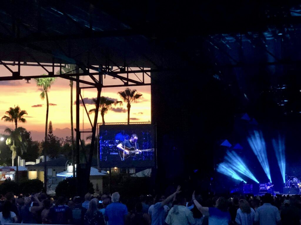 Dave Matthews Band performing in West Palm Beach at sunset.