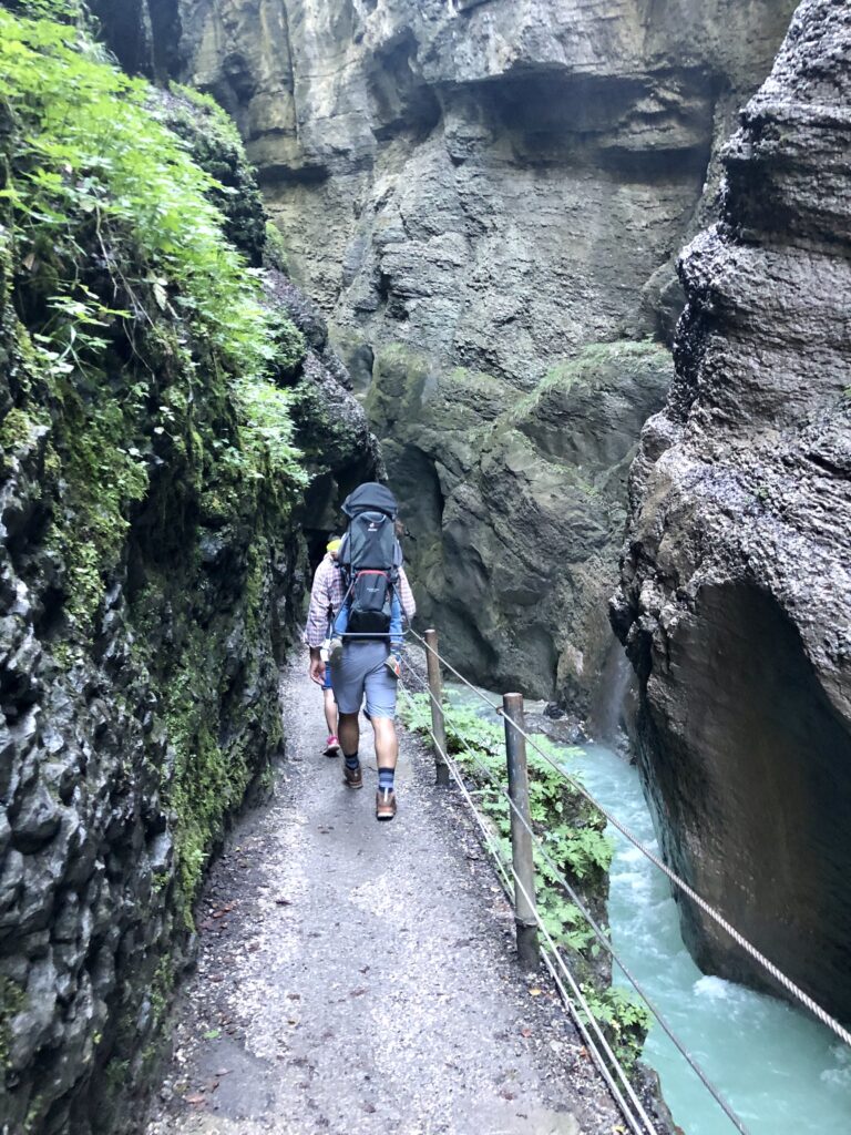 Blue green waters during a summer hike through the Partnach Gorge. 