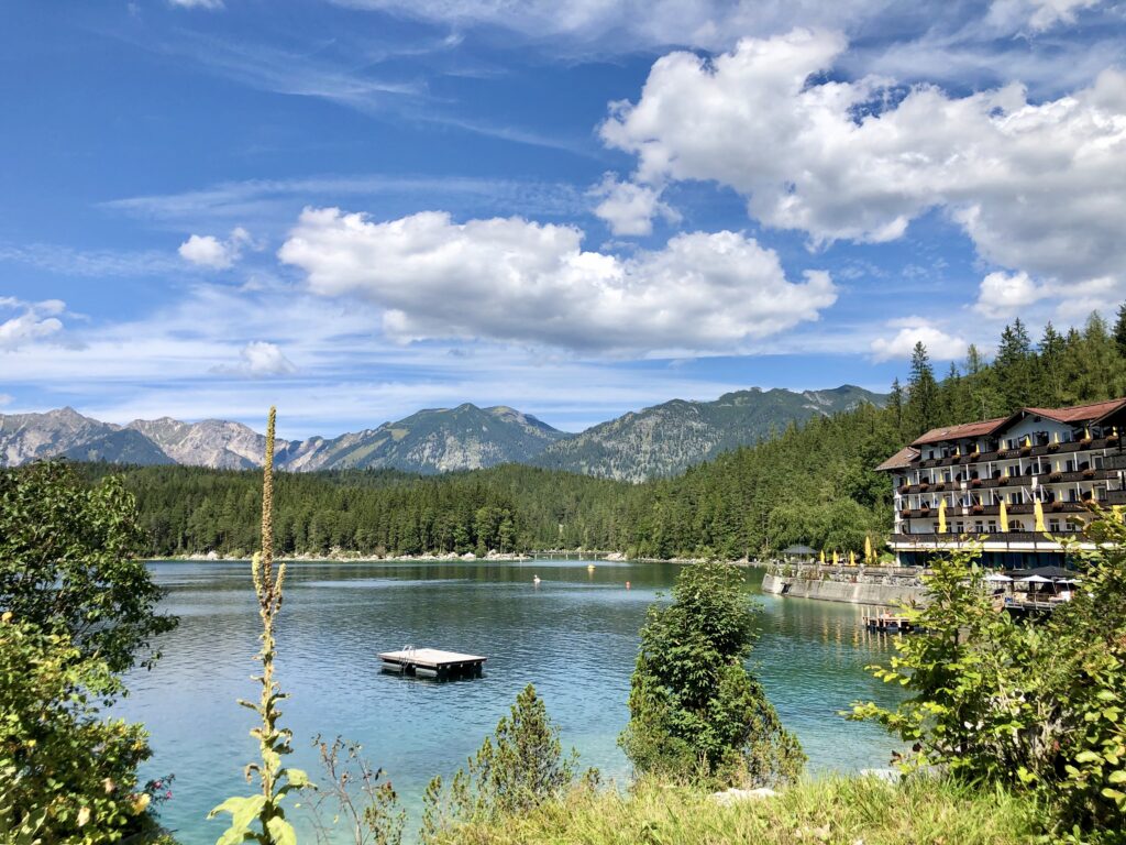 Nestled at the foot of Germany's towering Zugspitze, Lake Eibsee is a gem. Renowned for its crystal-clear turquoise waters and majestic mountain views, this Bavarian lake promises US travelers a piece of Alpine paradise.