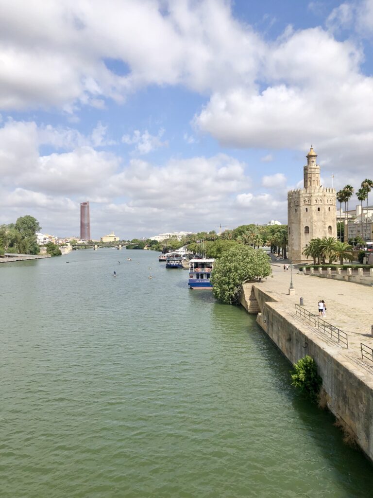 The beautiful water view from the bridge to the Triana neighborhood in Sevilla, Spain. 