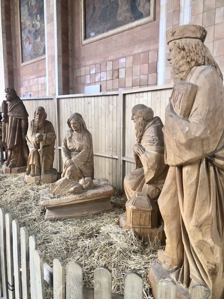 Baden-Baden Christmas market in Baden-Baden, Germany. The hand-carved wooden Nativity display. 